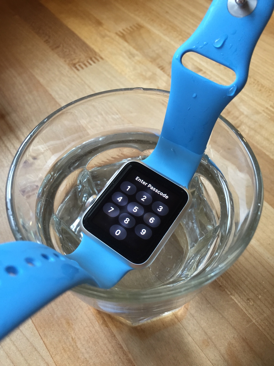 Passcode screen on submerged Apple Watch